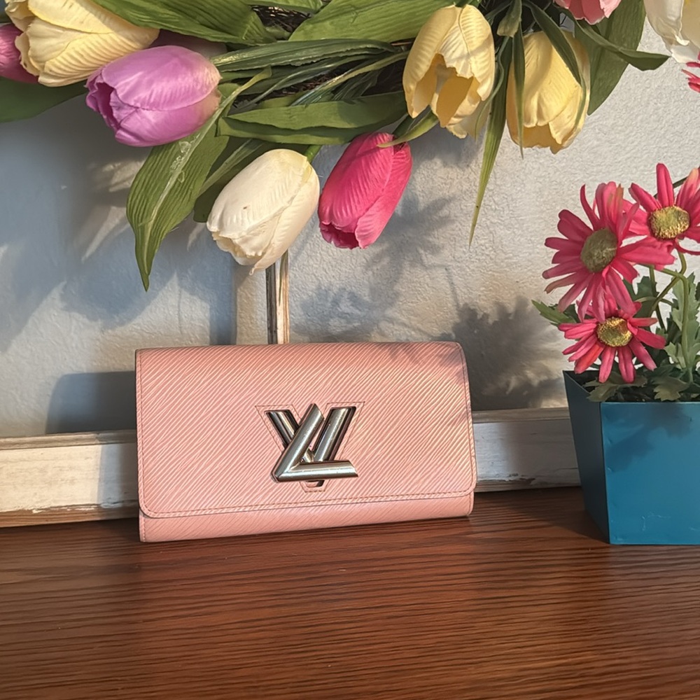 Louis Vuitton Epi pink leather twist lock wallet